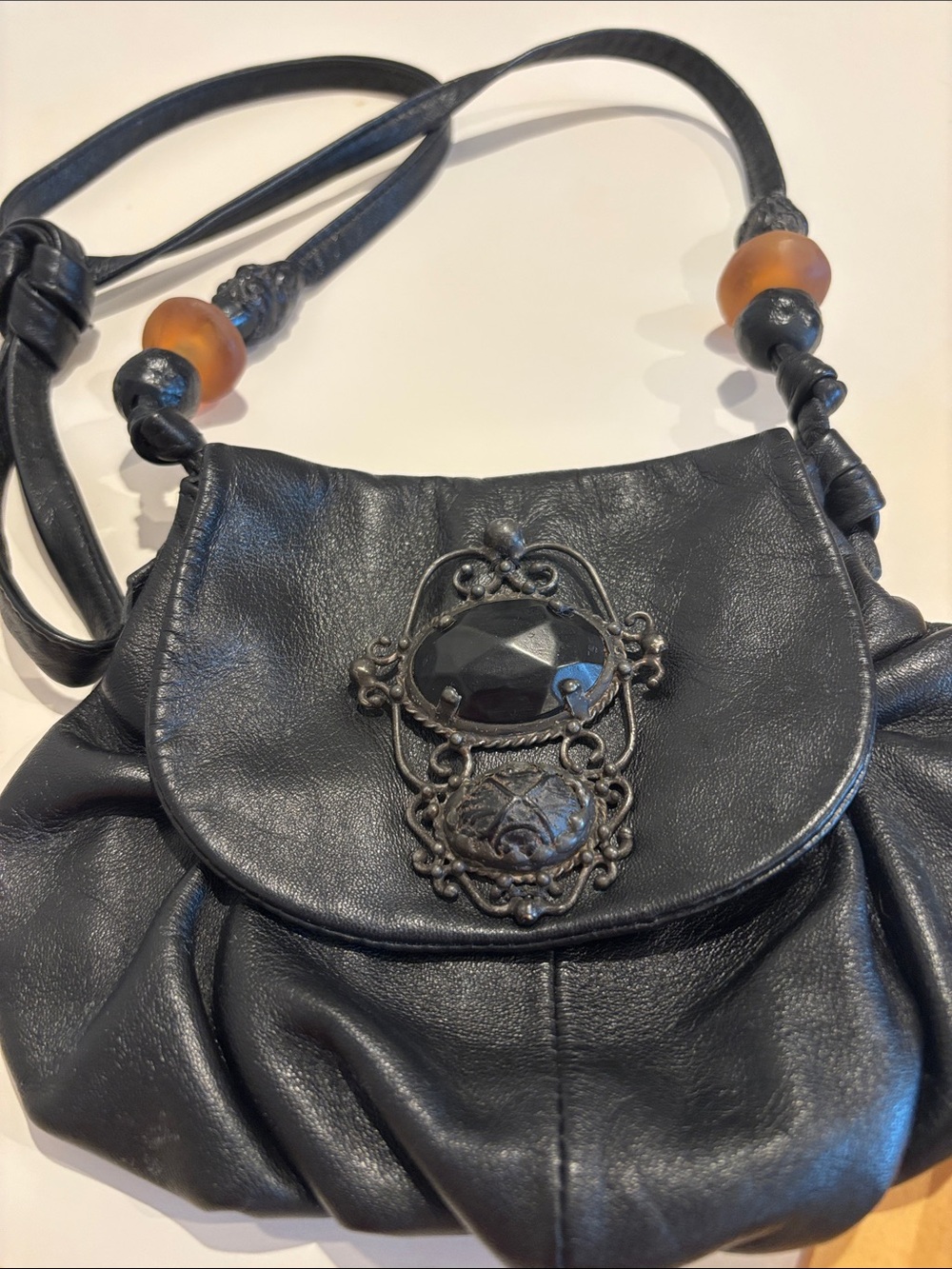 Maya Evangelista Black Leather Crossbody Bag with Decorative Gem Accent